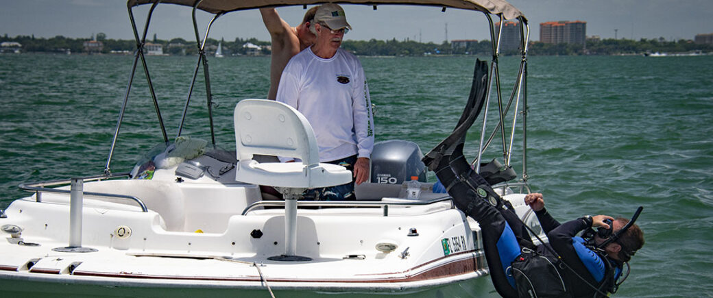 Diver John Federico Starting A Dive From A Boat