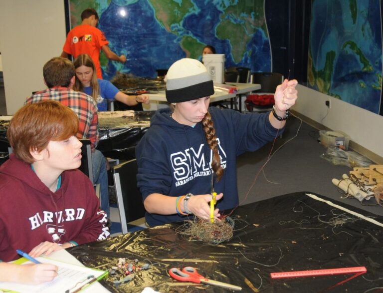 Sarasota Bay Watch Volunteers Measuring Monofilament At Mote Marine