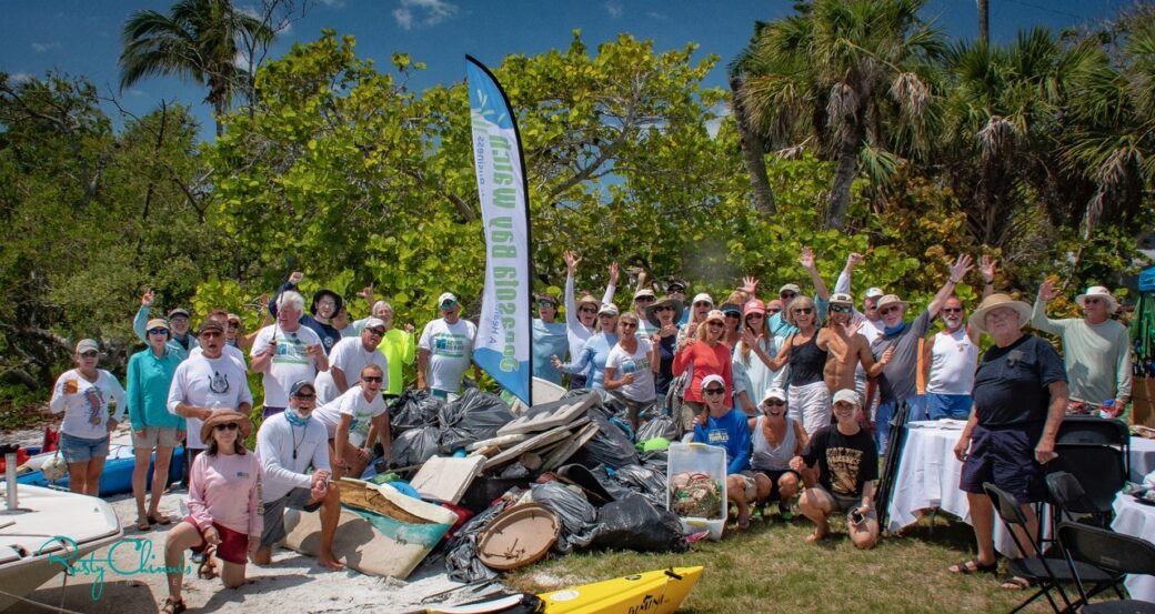 Sister Keys Clean Up Volunteers With Huge Pile Of Trash