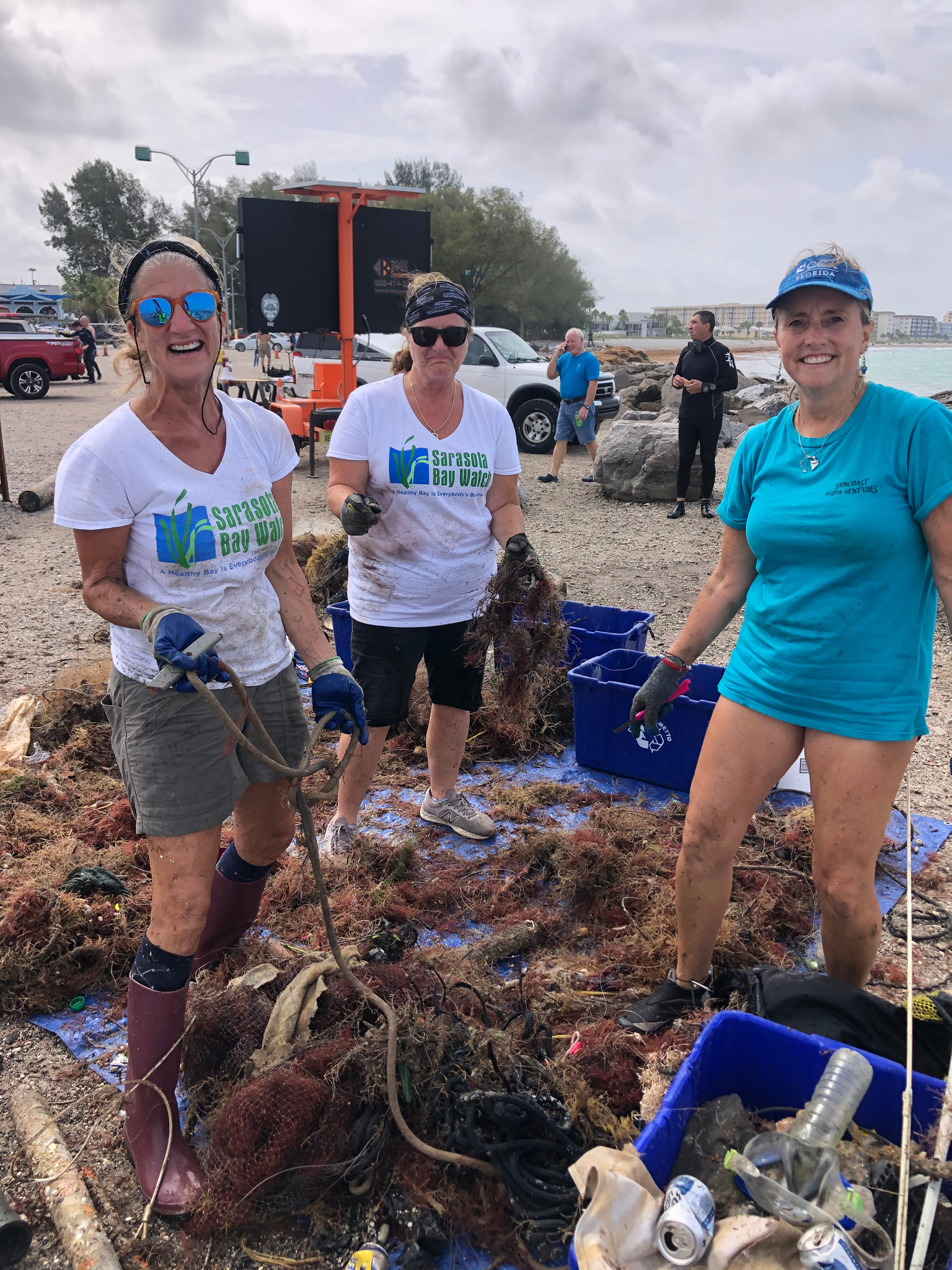 Volunteers Sorting Items At South Jetty Venice FL