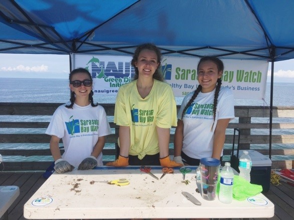 Young Sarasota Bay Watch Volunteers Manning A Booth